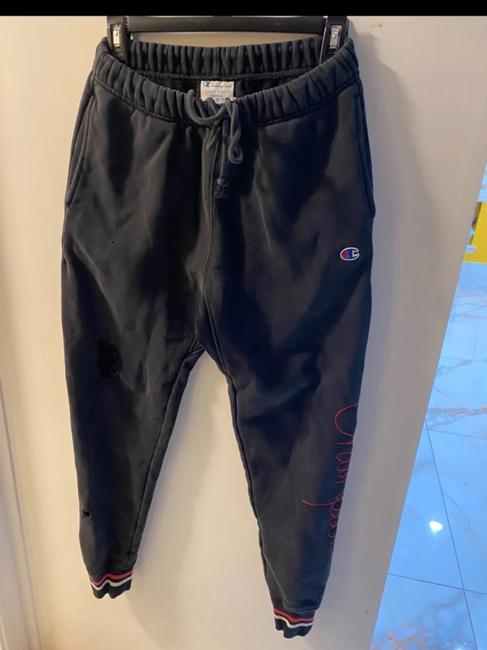 Champion Black Joggers with Red Trim and Pocket
